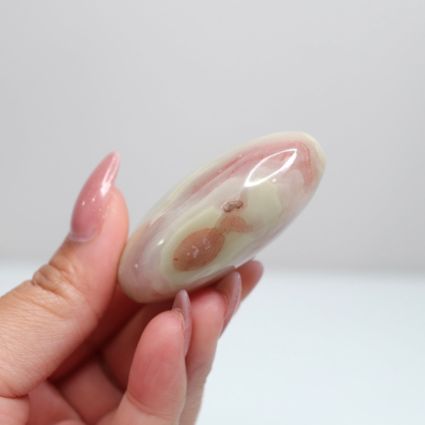 Pink Banded Onyx Palm Stone | 61