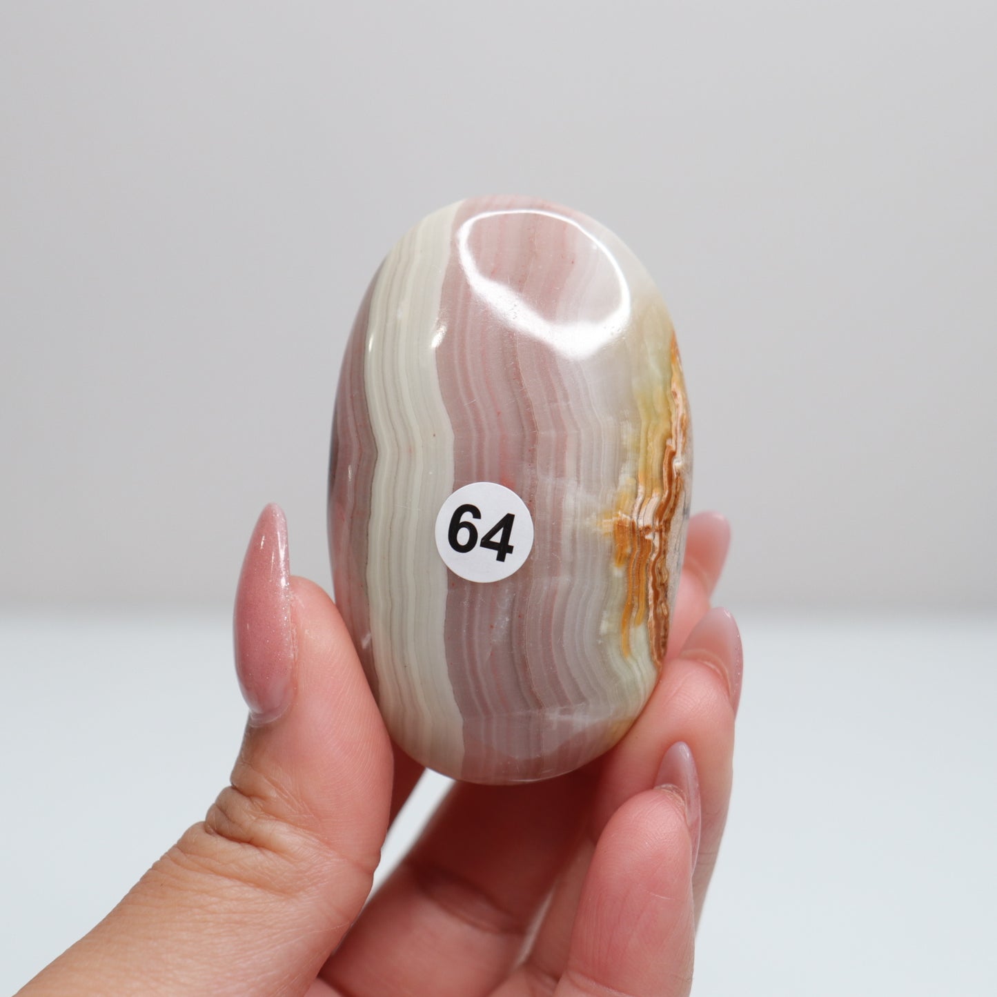 Pink Banded Onyx Palm Stone | 64