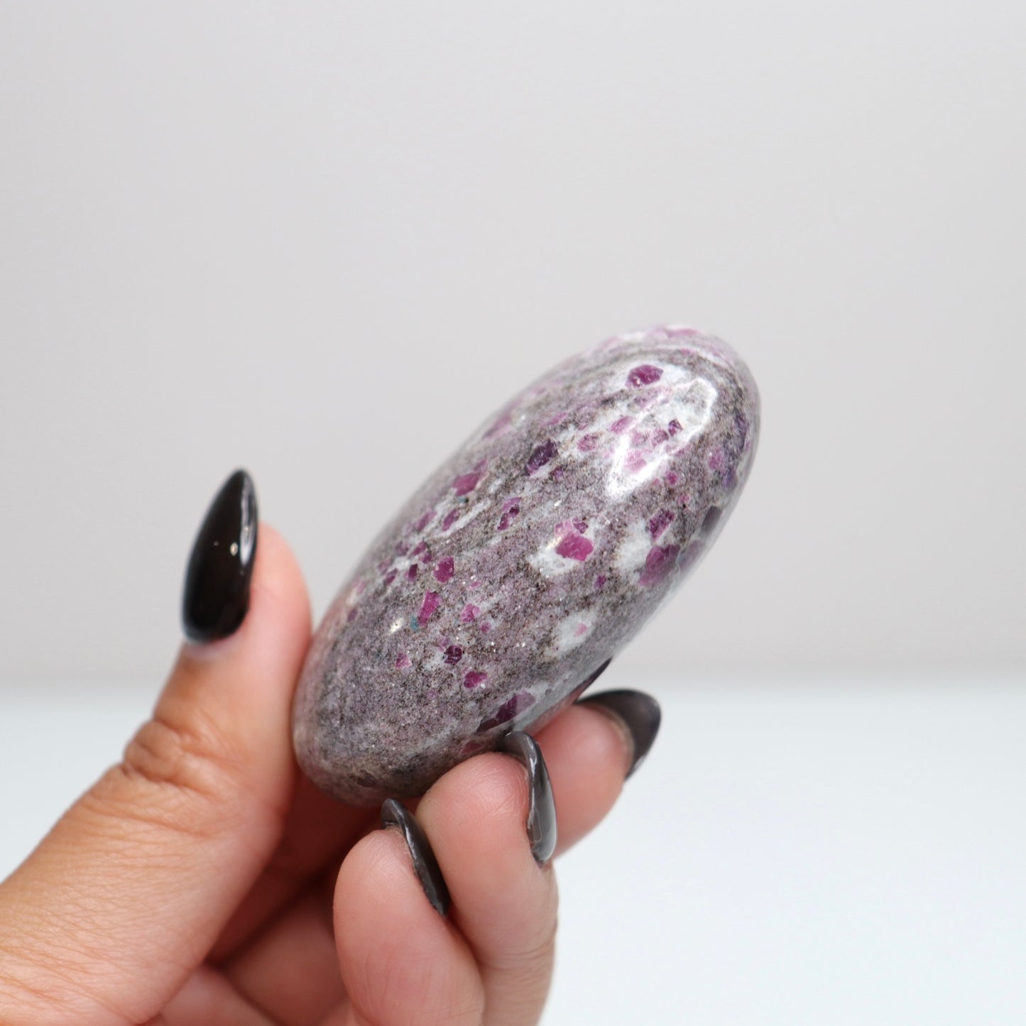Ruby Albite Palm Stone 54