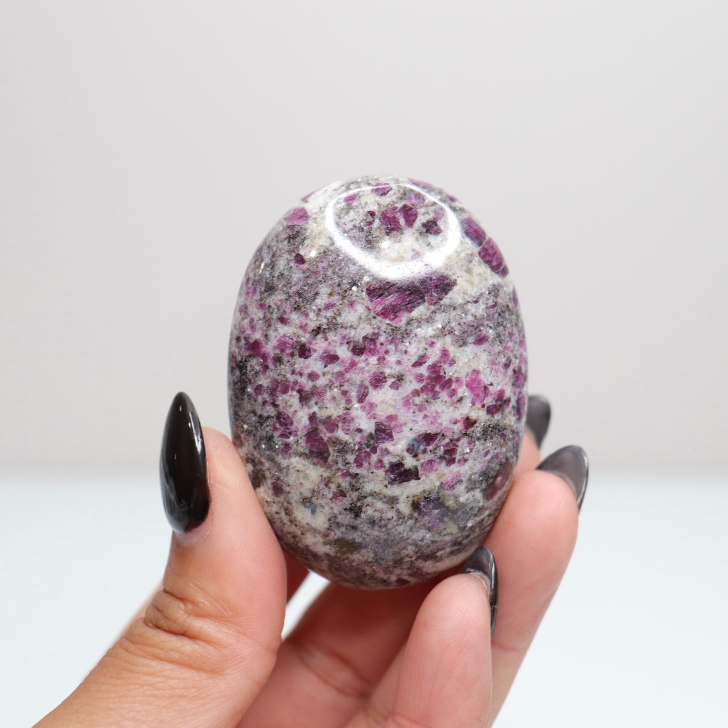 Ruby Albite Palm Stone 52