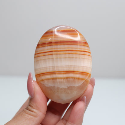Orange Aragonite Palm Stone | 63*
