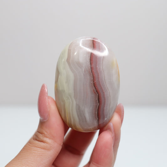 Pink Banded Onyx Palm Stone | 62
