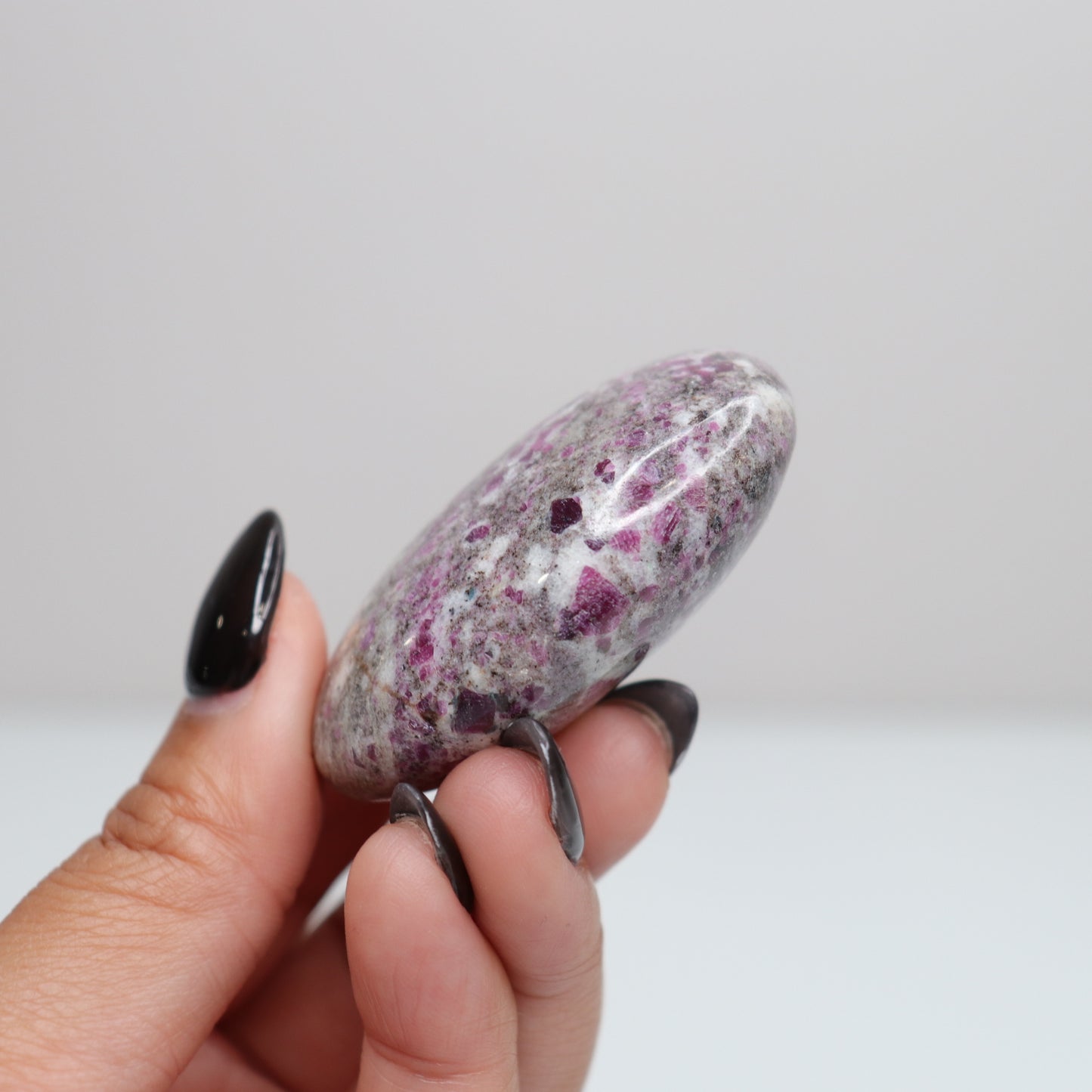 Ruby Albite Palm Stone 49
