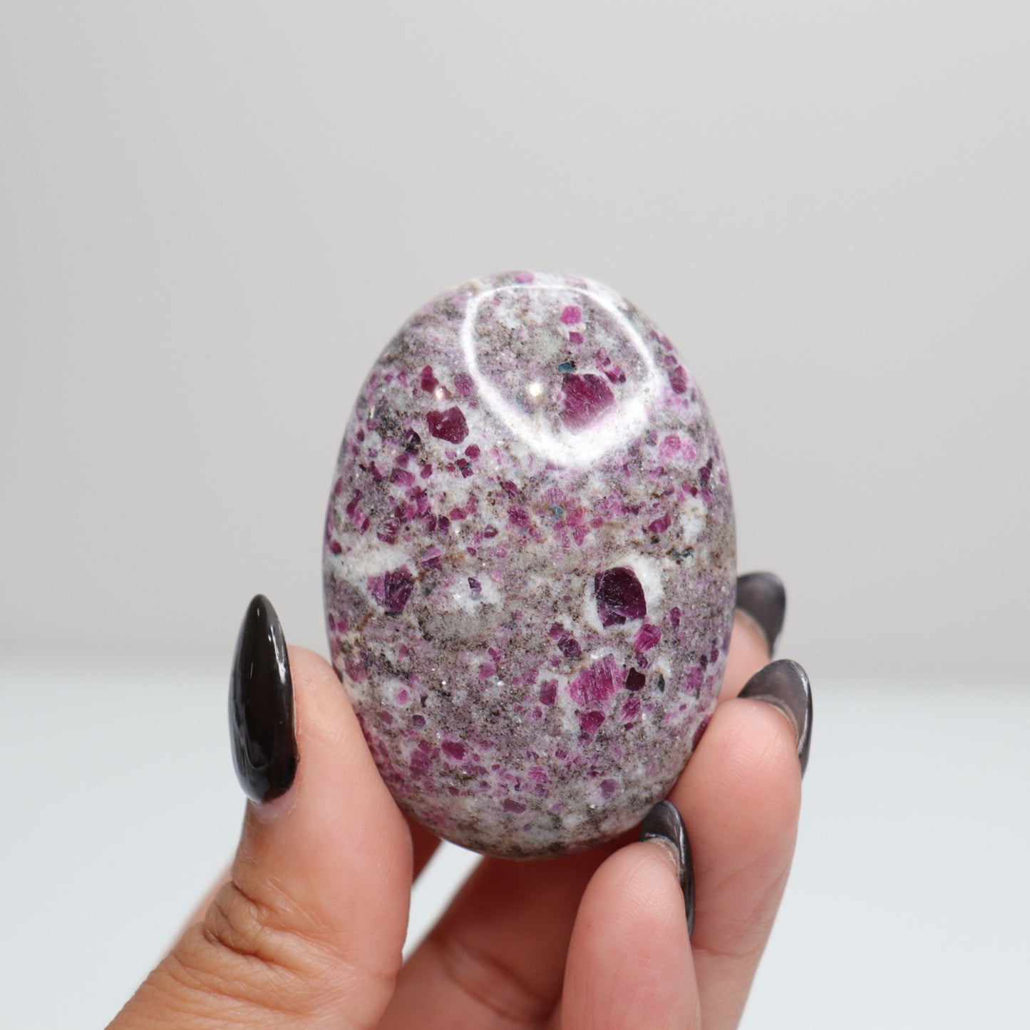 Ruby Albite Palm Stone 49