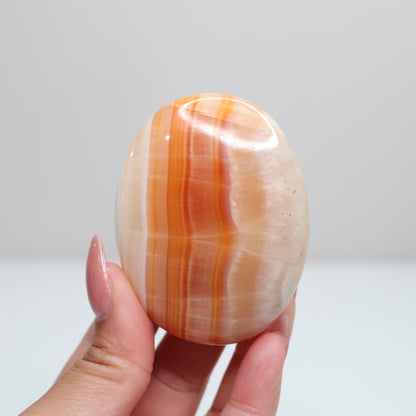 Orange Aragonite Palm Stone | 62