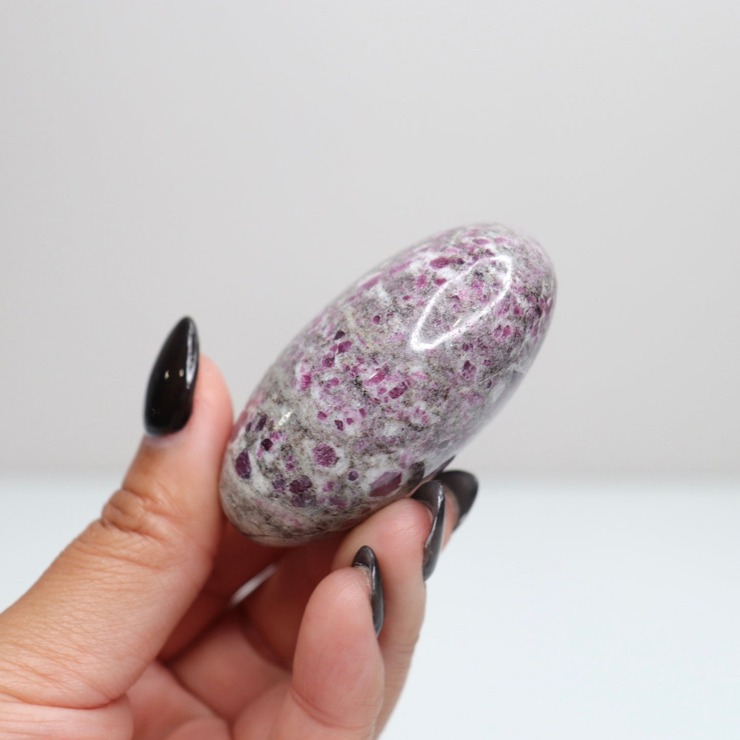 Ruby Albite Palm Stone 55