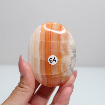 Orange Aragonite Palm Stone | 64