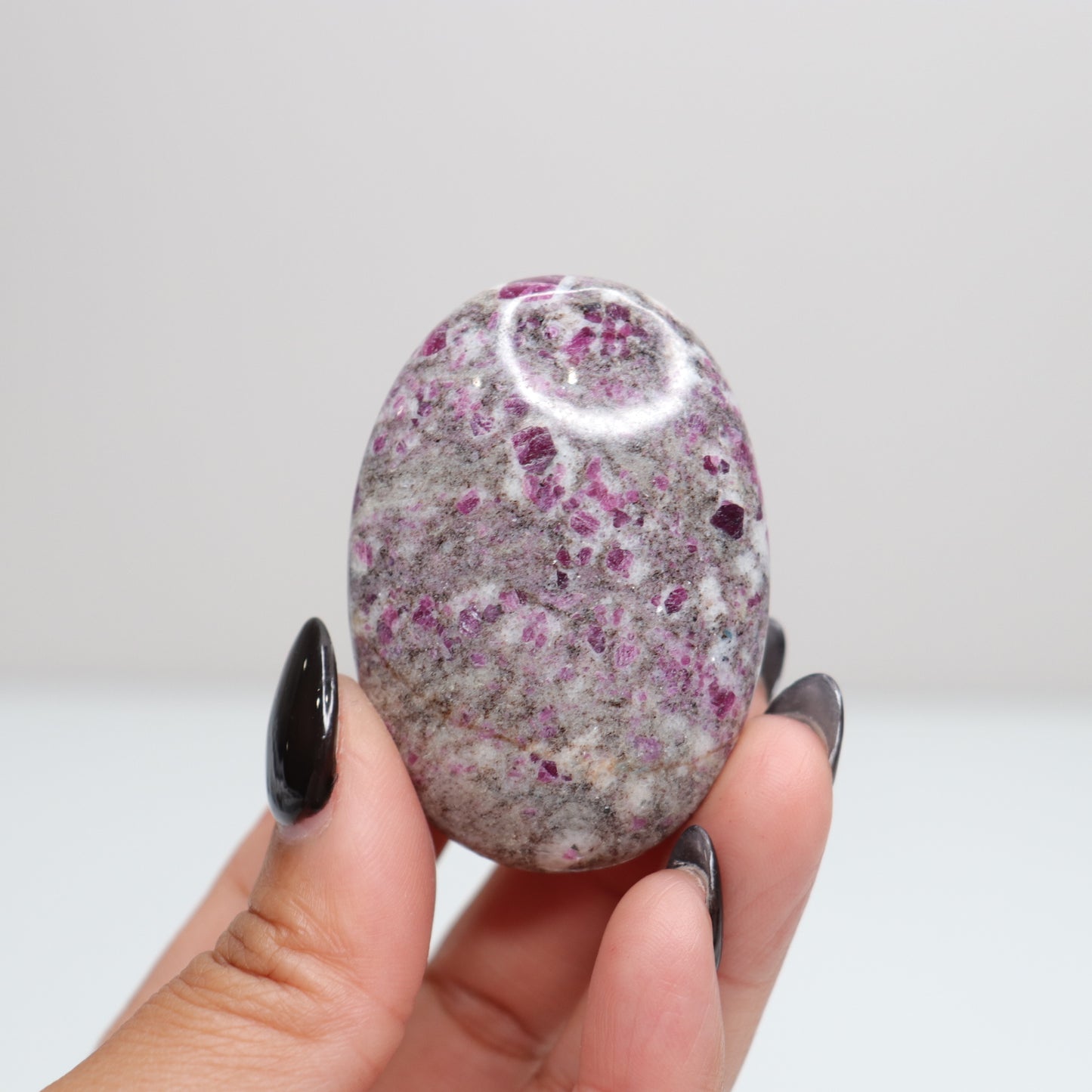 Ruby Albite Palm Stone 49