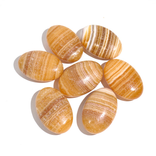 Orange Calcite Palm Stones | Misfits *