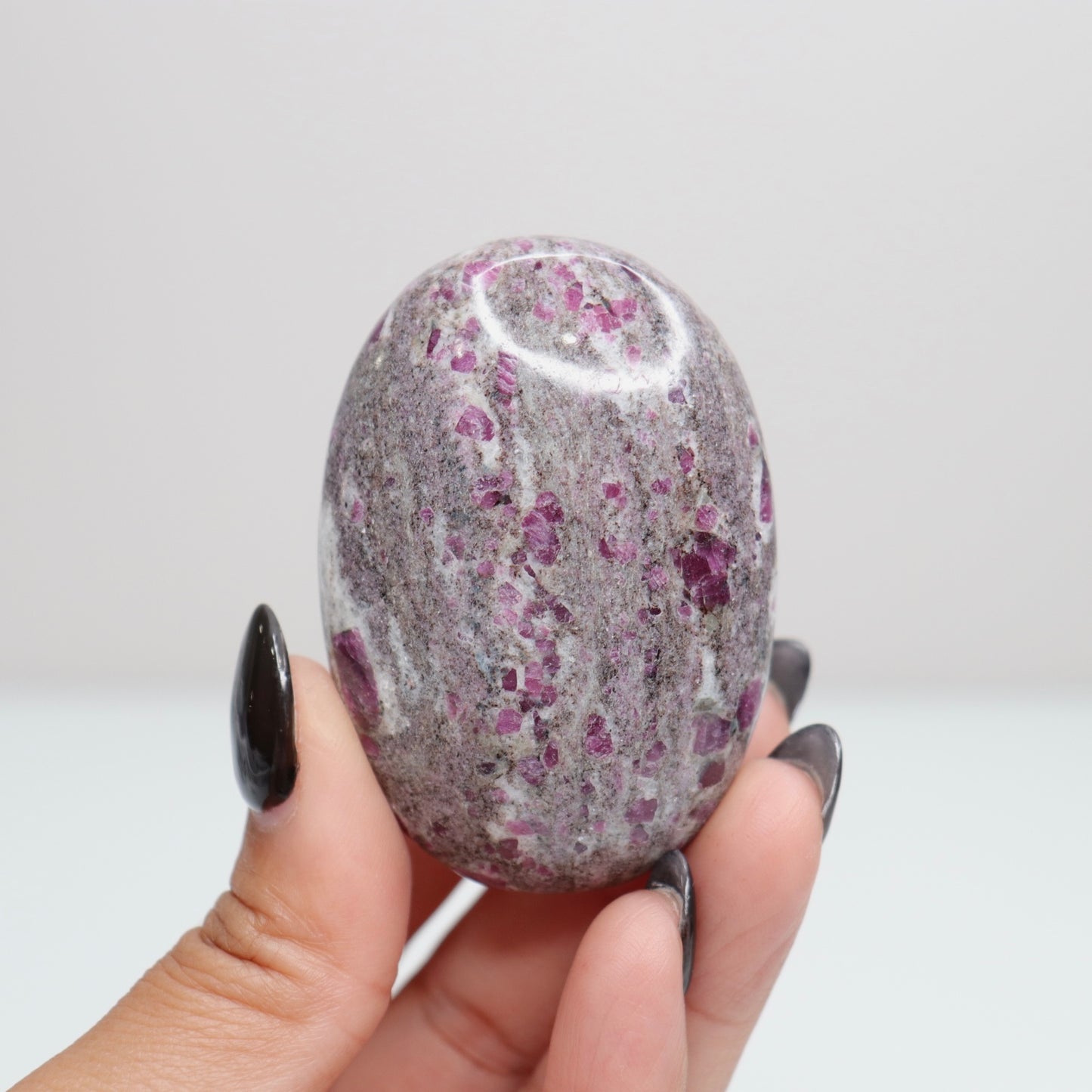 Ruby Albite Palm Stone 54