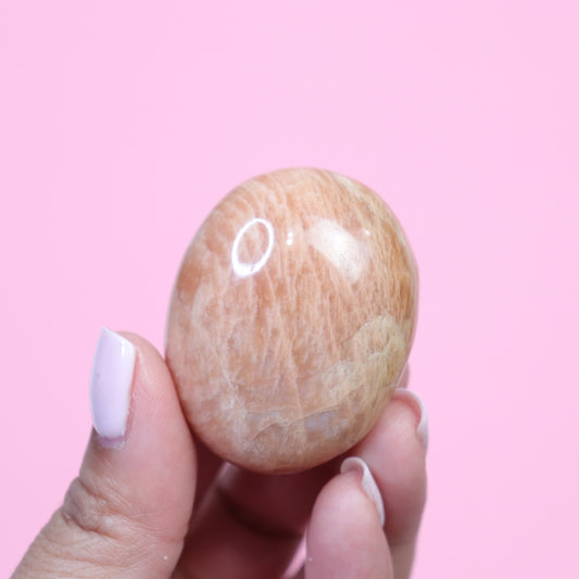 Peach Moonstone Palm Stone  - Crescents & Crystals
