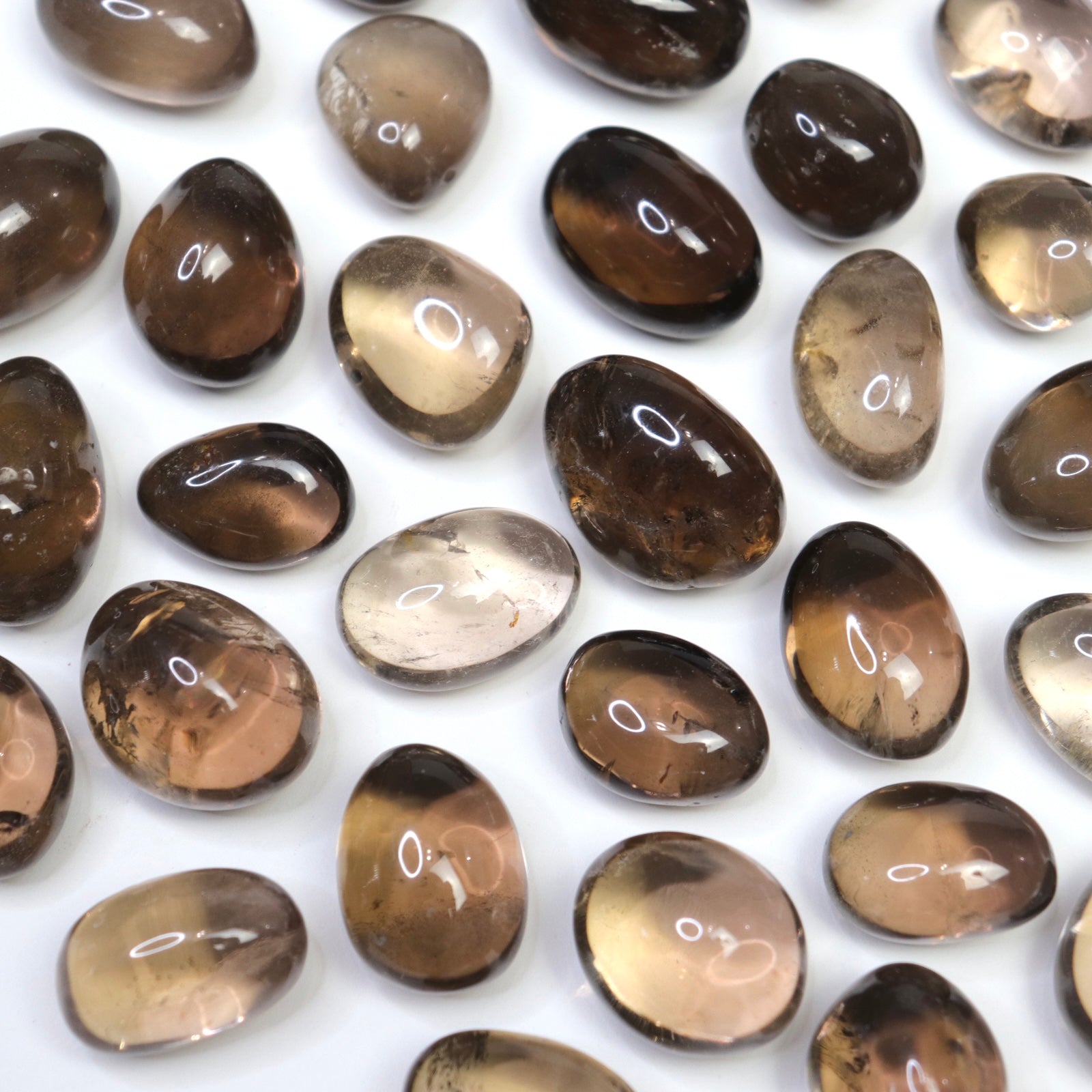 Smokey Quartz Tumbles - Crescents & Crystals