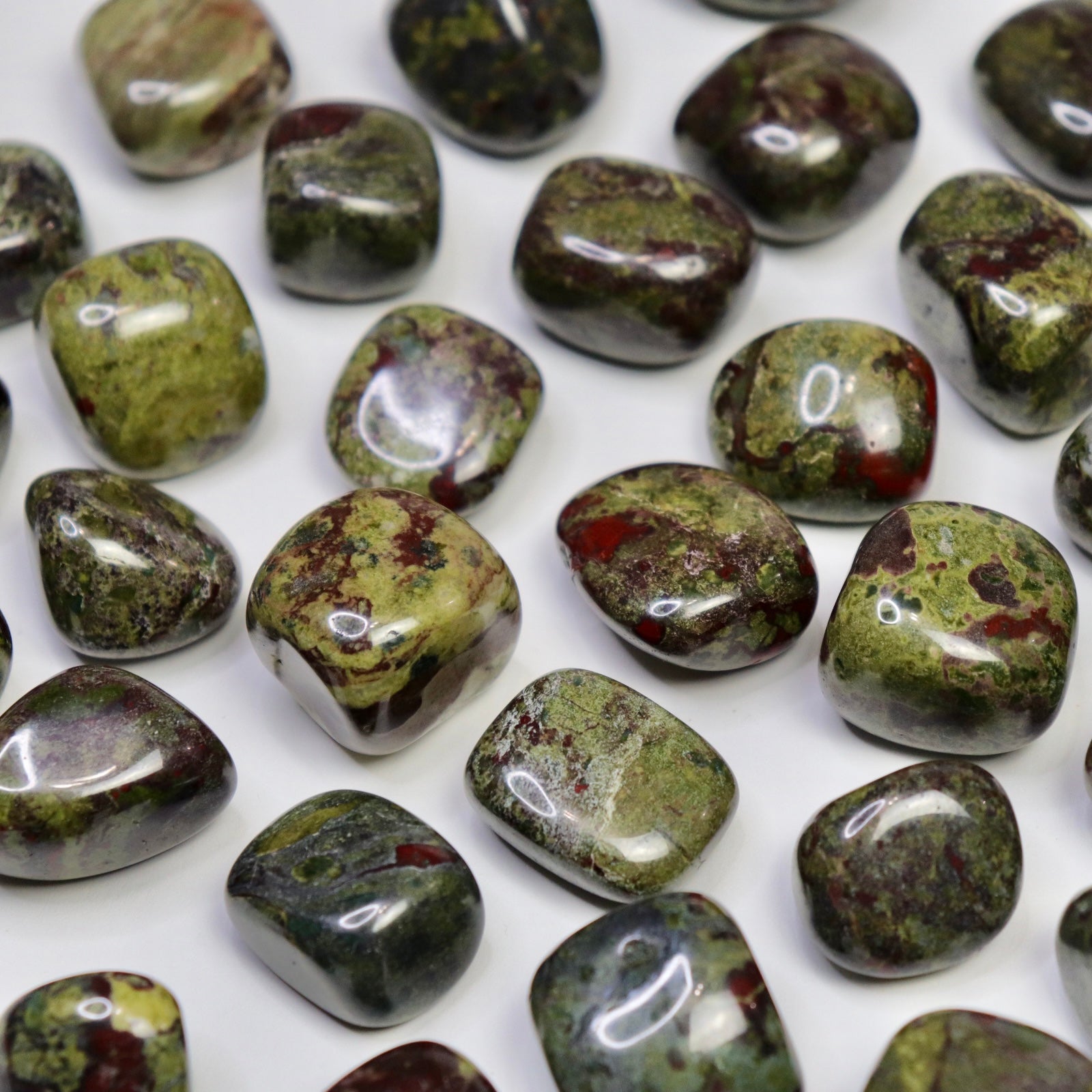 Dragon Blood Stone Tumbles- Crescents & Crystals