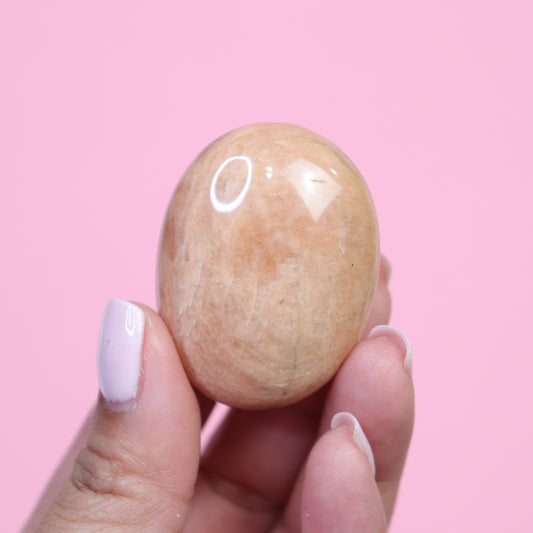 Peach Moonstone Palm Stone  - Crescents & Crystals