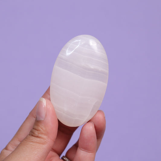 Pink Mangano Calcite Palm Stone - Crescents & Crystals